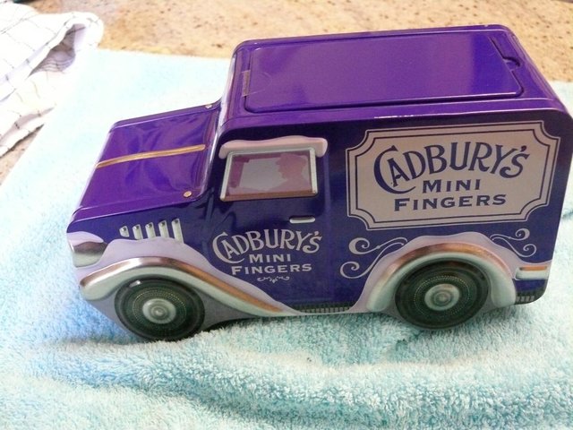 Preview of the first image of collectable Cadbury's Mini Finger Tin Old Van.