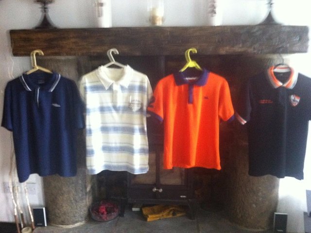 Preview of the first image of 4 designer mens polo shirts...Reduced!.