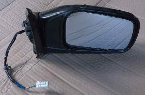 Preview of the first image of Nissan Almera door mirror driver's side Mk 2.