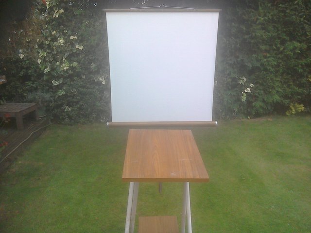 Preview of the first image of PROJECTOR SCREEN AND PROJECTOR STAND.
