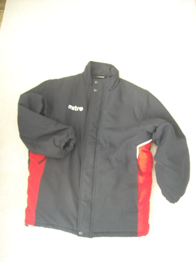 Preview of the first image of Mitre Boy's Jacket Black Age 13.