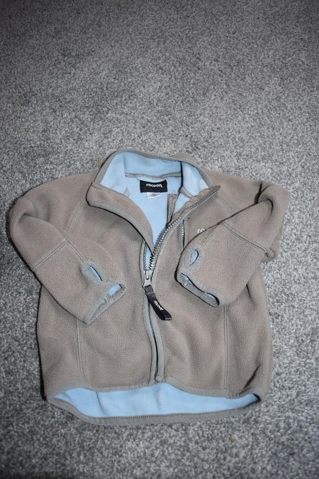Preview of the first image of Beautiful designer baby polar fleece jacket by Racoon.