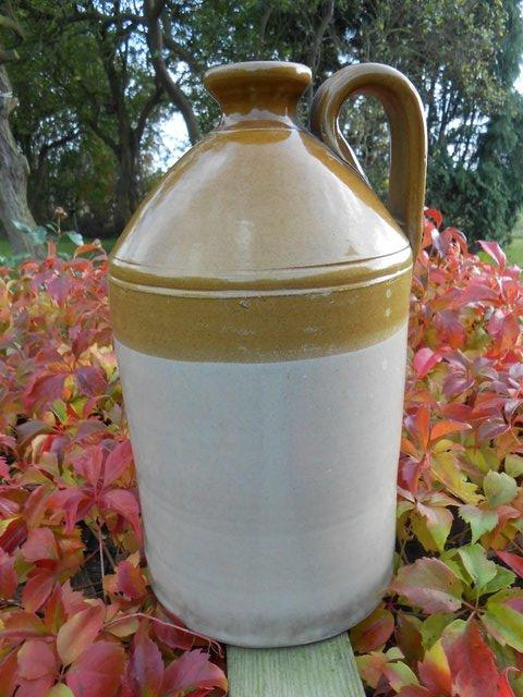 Preview of the first image of LARGE STONEWARE FLAGON JUG.