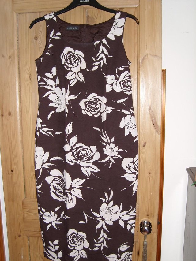 Preview of the first image of Alex & Co Classic Brown & White Dress – size 12.