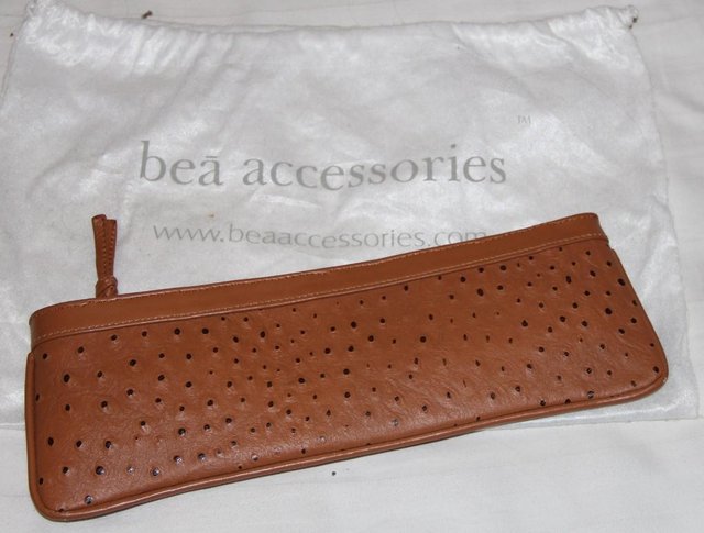 Preview of the first image of Bea Accessories Tan Clutch.