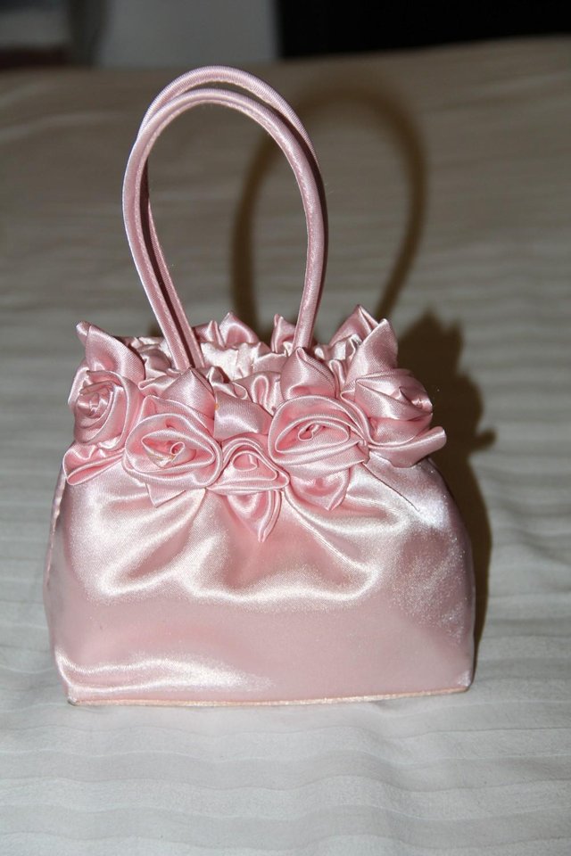 Preview of the first image of Cute Pink Evening Handbag with Rose Details.
