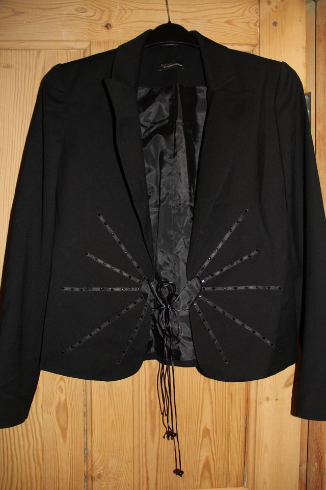 Preview of the first image of Isobell Kristensen “Dreams” Black Jacket Top Size 10-12.