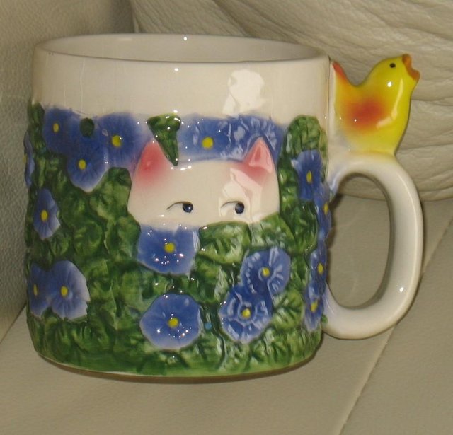 Preview of the first image of Pretty, decorative MUG - CAT amongst flowers chick on handle.