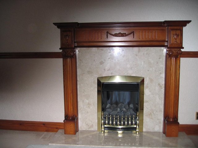 Preview of the first image of Cream marble hearth and fire back.