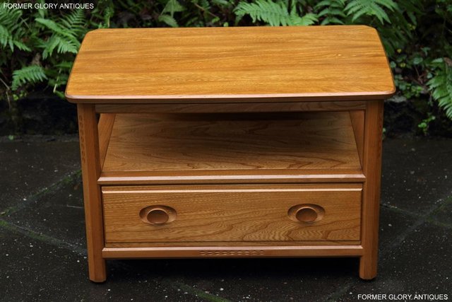 Preview of the first image of ERCOL LIGHT ELM CORNER TV DVD CABINET STAND TABLE BOOKCASE.