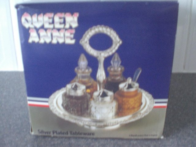 Preview of the first image of Queen Anne Silver Plated revolving cruet set (new and boxed).