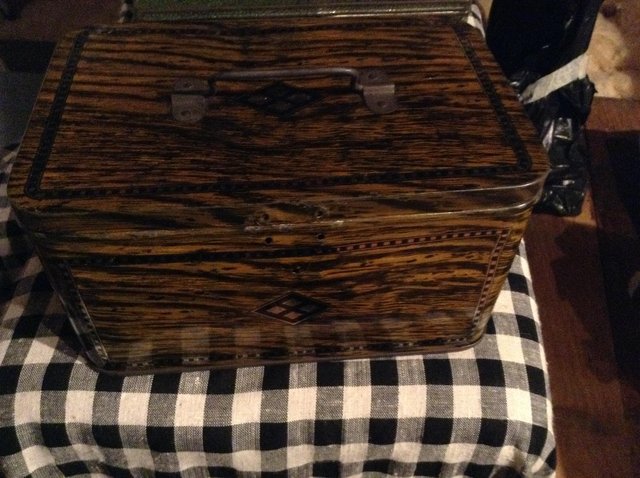 Preview of the first image of Vintage tin box with handle.