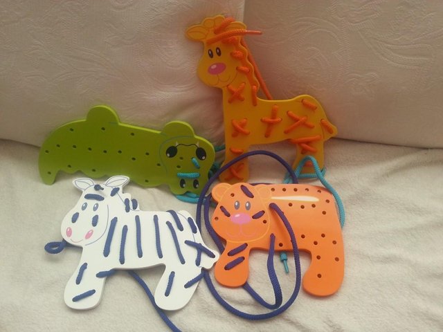 Preview of the first image of ELC Wooden Lacing Animals x 4 (in gift tin).