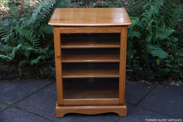 Preview of the first image of ERCOL LIGHT ELM TV HI FI DVD CD STAND MEDIA CABINET HALL LAM.