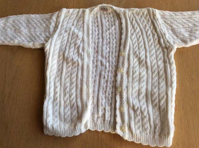Preview of the first image of Child's Knitted Cardigan.