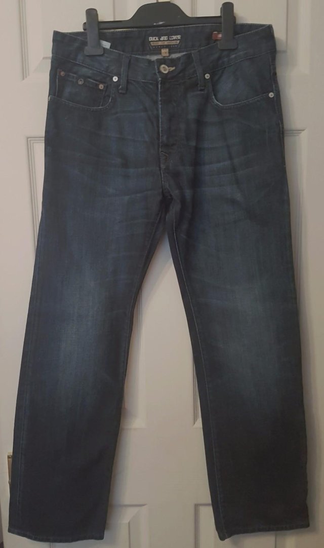 Preview of the first image of Men's Dark Denim Boxsir Jeans By Duck And Cover 30" W/30" L.
