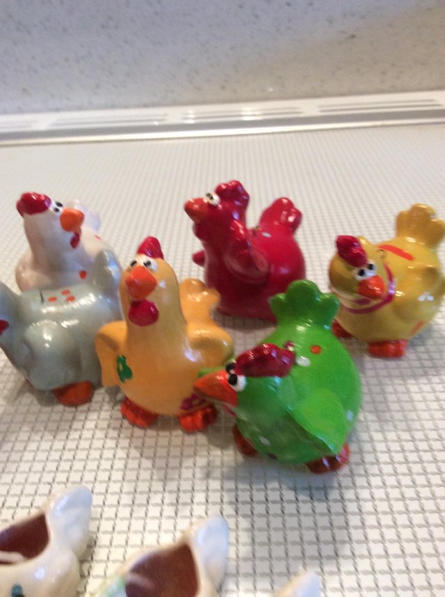 Preview of the first image of Tiny ceramic hen ornaments.