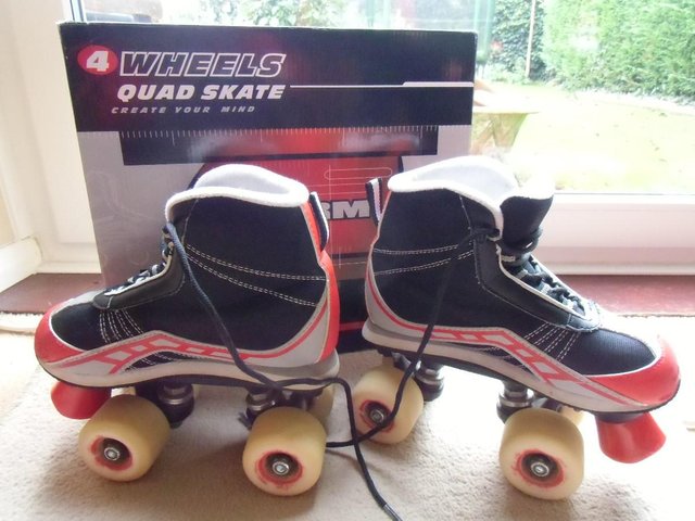 Preview of the first image of Boy's size 2 quad skates "Storm".