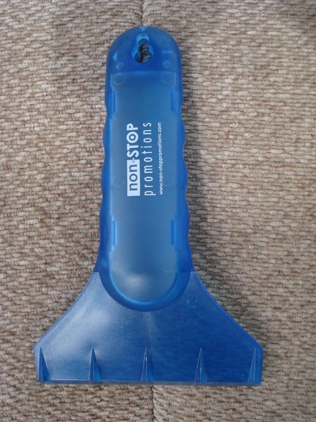Preview of the first image of NEW BLUE ICE/SNOW SCRAPER WITH COMFORTABLE HAND GRIP.