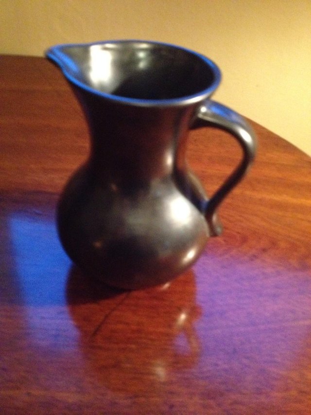 Preview of the first image of PRINKNASH Abbey Pottery jug with pewter metalic glaze.