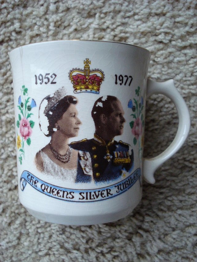 Preview of the first image of ANTIQUE QUEEN ELIZABETH II SILVER JUBILEE 1952-77 MUG.