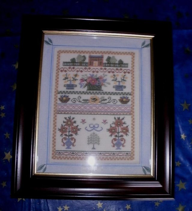Preview of the first image of completed Cross stitch framed.