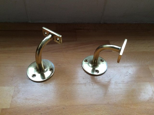 Preview of the first image of Brass hand rail brackets.