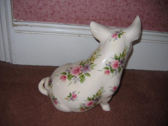 Image 2 of Vintage sitting Pottery pig floral pattern pretty but has cr