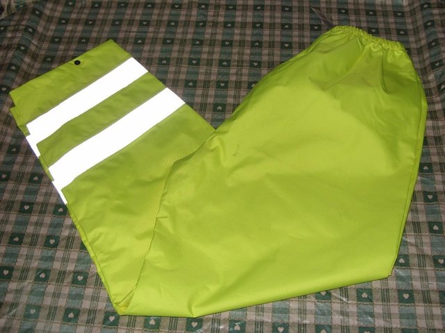 Preview of the first image of HIGH VIZ WORK over  TROUSERS  REFLECTIVE strip.