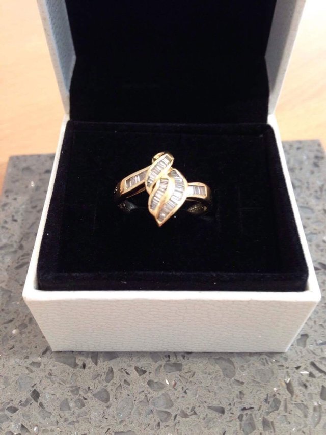 Preview of the first image of Modern design baguette cut diamond ring.