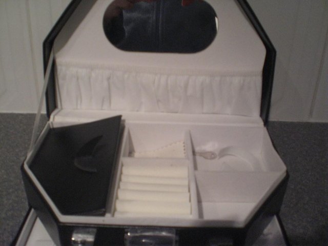 Preview of the first image of Black synthetic leather look brand new jewellery box.
