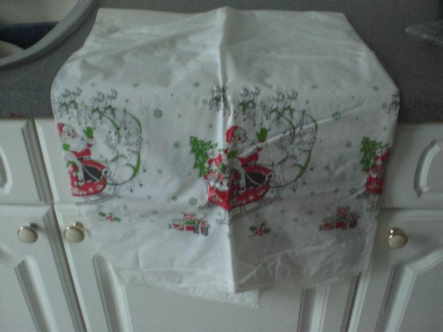 Image 2 of Christmas plastic Table cover (New and factory sealed)