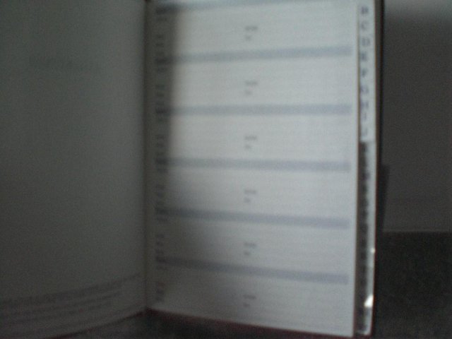 Preview of the first image of A6 Black Address Book - Brand New.