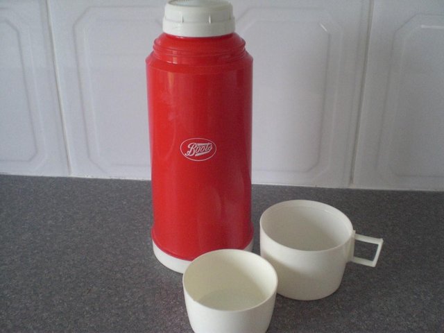 Image 2 of Large Red Thermos Flask from Boots, with two white cups