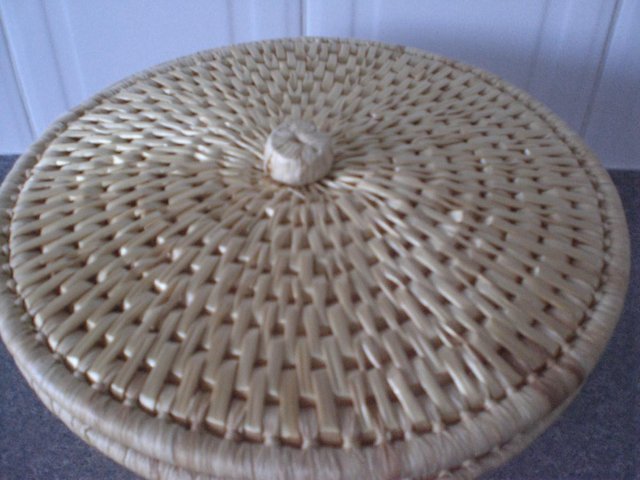 Preview of the first image of Attractive Round Wicker Sewing/storage basket with lid.
