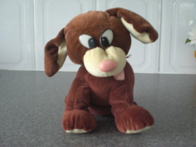 Preview of the first image of Soft Cream and brown soft dog toy (New).