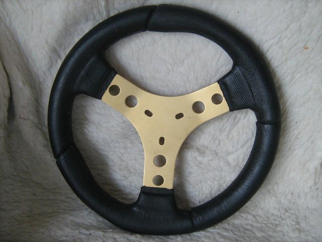 Preview of the first image of LEATHER 11.5" STEERING WHEEL & CUSTOM PIN STRIPE TAPE.
