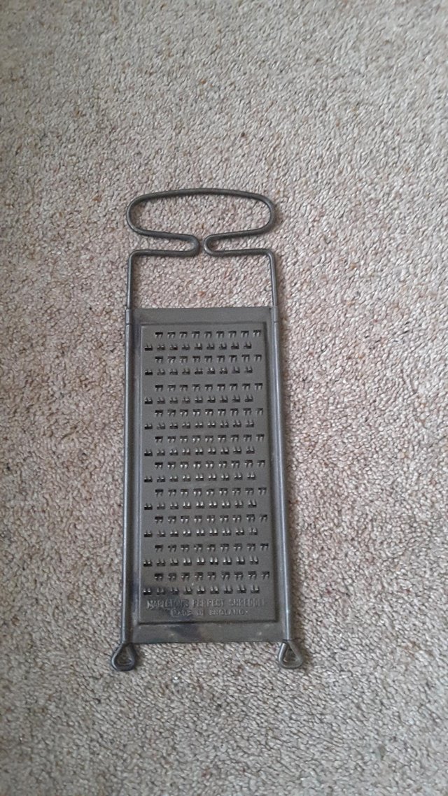 Preview of the first image of VINTAGE CHEESE GRATER - MAPLETON'S PERFECT SHREDDER.
