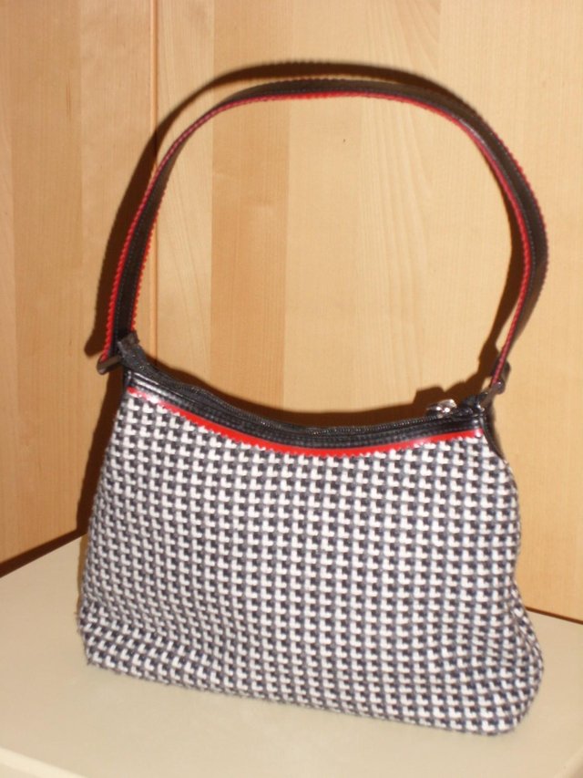 Preview of the first image of M&S Check Handbag With Red Detail.