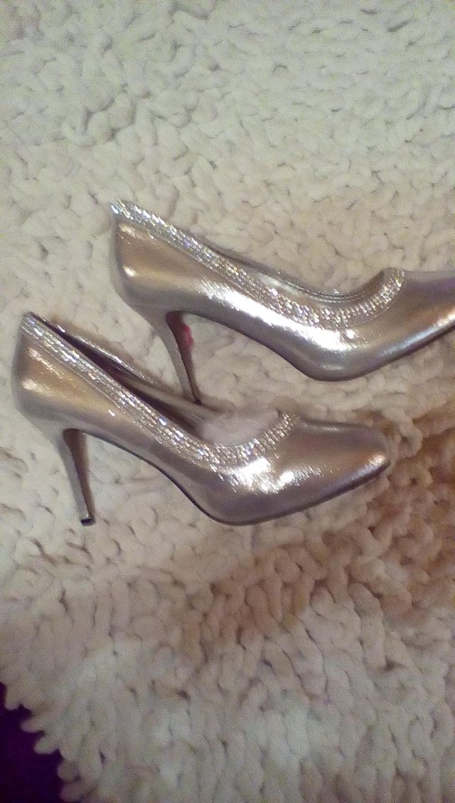 Preview of the first image of Ladies silver wedding shoes.