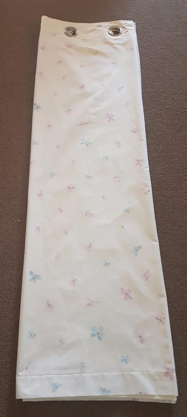 Preview of the first image of Pretty White Ring top Curtains With Butterfly/flower Print.
