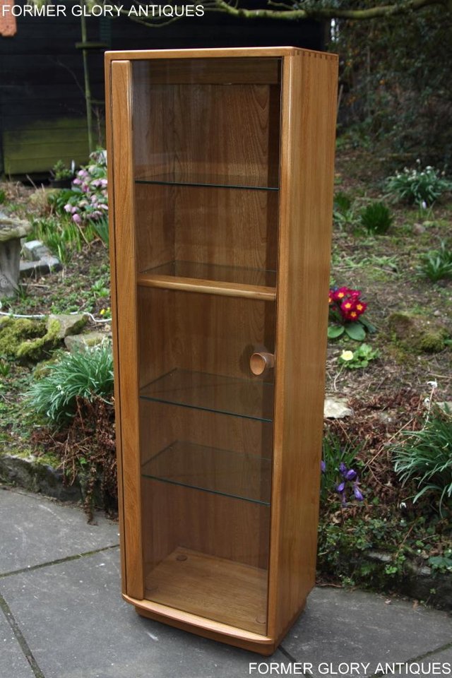 Preview of the first image of ERCOL WINDSOR LIGHT ELM DISPLAY CABINET SHELVES STAND UNIT.
