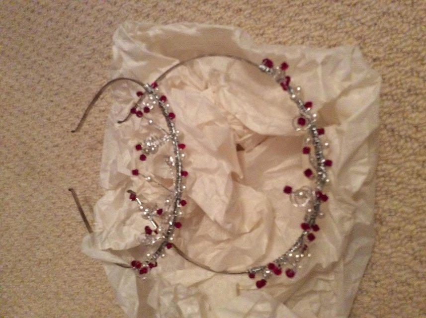 Preview of the first image of Red and clear beaded tiara with silver band.