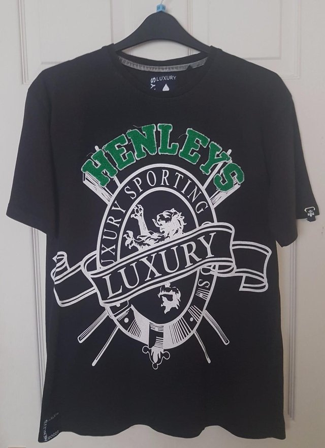 Preview of the first image of Henleys Luxury Sporting Black T Shirt - Sz 5 (XL).
