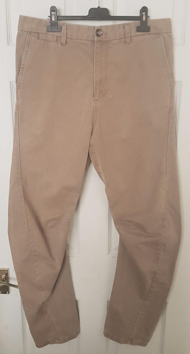 Preview of the first image of Men's Twisted Leg Jeans By River Island - Sz 32/32.
