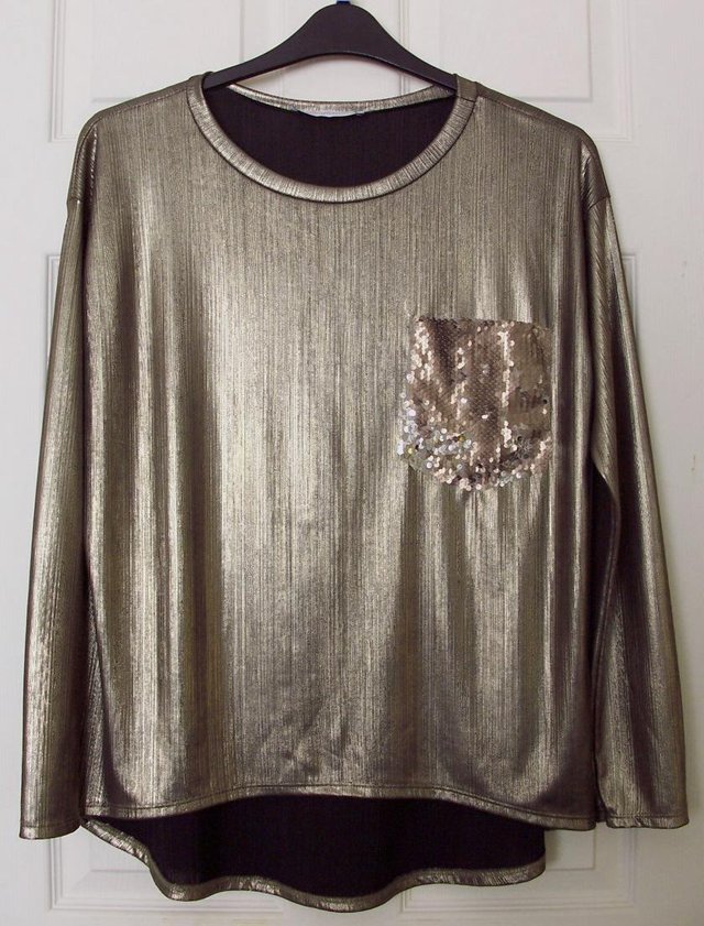 Preview of the first image of Gold Long Sleeve Designer Top By Rinascimento - Sz XL.
