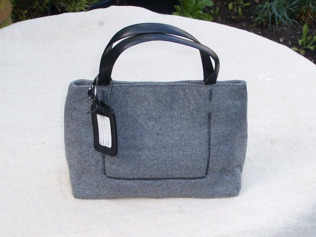 Preview of the first image of Benetton - Small Grey Hand Held Tote Handbag.