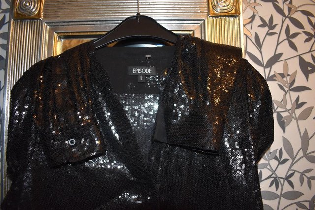 Preview of the first image of size 12 black fine sequinned shirt/jacket by Episode.