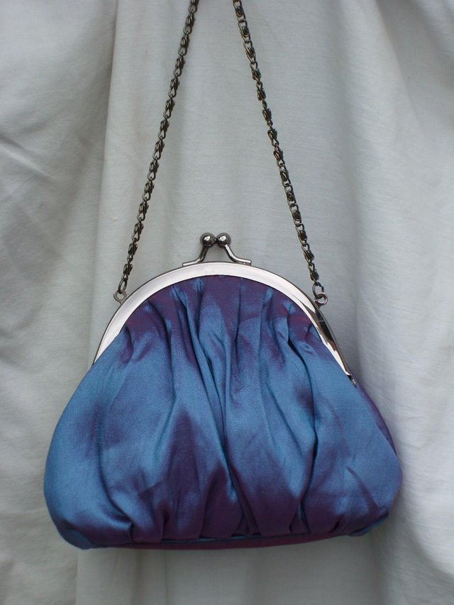 Preview of the first image of Cute Blue/Purple Evening Handbag.