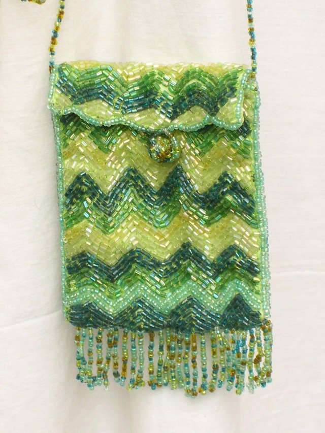 Preview of the first image of Cute Small Green Beaded Penny Purse/Handbag.